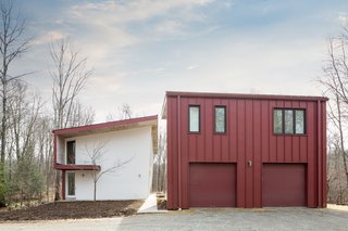 An Eco-Friendly Connecticut Home Wants $650K - Photo 10 of 10 - Above the two-bay garage is a guest apartment (approximately 600 square feet.) that features a sleeping alcove, kitchen, bath, living room, laundry area, gas fireplace, and balcony. 