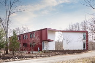 An Eco-Friendly Connecticut Home Wants $650K - Photo 1 of 10 - The home has a unique industrial aesthetic thanks to the use of eco-friendly structural insulated panels (SIPs) that are prefabricated off-site, manufactured with a minimum amount of waste, and then quickly assembled on the property. 
