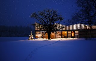 10 Buildings We Love by Piers Taylor - Photo 19 of 26 - The "folded roof" is also designed to collect rainwater, which is harvested for the adjacent vegetable garden.