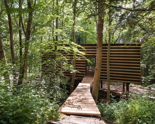 10 Buildings We Love by Piers Taylor - Photo 8 of 26 - The studio is built on two floors—there is a 592-square-foot enclosed space accessed via a bridge from the slope, which is above an open workshop.