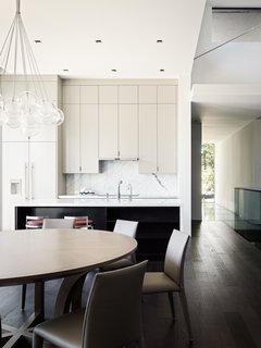 This Concrete Abode Stretches Over Giant Boulders - Photo 8 of 17 - The interior has a strong sense of light and dark from the many sources of natural light. 
