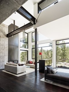 This Concrete Abode Stretches Over Giant Boulders - Photo 5 of 17 - The home was designed for the client's multigenerational family, with each member contributing their own ideas. 