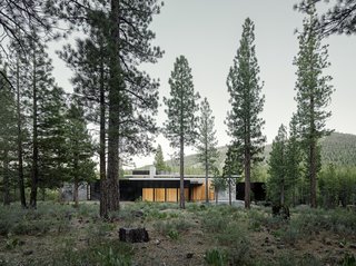 This Concrete Abode Stretches Over Giant Boulders - Photo 14 of 17 - A view of the sprawling home from the South elevation. 