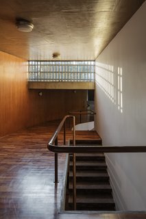 A Modern Concrete Retreat by Oscar Niemeyer Is Available For the First Time - Photo 5 of 6 - A sinuous ramp links public to private spaces. Many elements of the design were devised to ensure a sense of privacy for the homeowners.