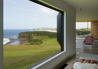 Instead of providing the same view throughout the house, the architects have created thoughtful framed views of the surroundings. 