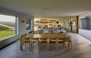 The dining area features views of the sea and also opens to the interior courtyard, giving it a unique sense of access to the nearby nature. 