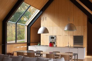 A Minimalist, Rick Joy–Designed Farmhouse in Vermont Asks $9.25M - Photo 5 of 12 - The open-plan living room ensures fluidity between spaces and functions. 