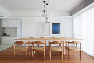 The firm created custom furniture for the home's renovation, including this dining table.