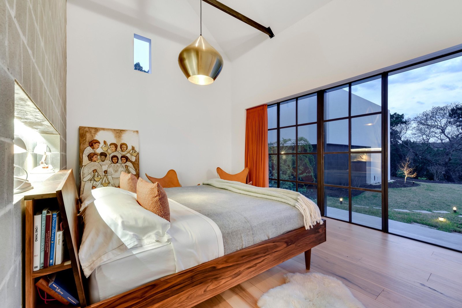 One of the homes' five bedrooms opens to the yard.