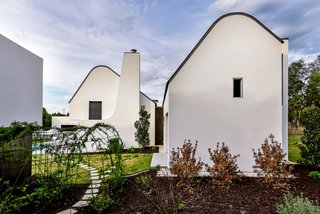 Own This Alluring Sculptural Abode in Austin For $3.1M - Photo 21 of 21 - As you can see from above, the stucco volumes create a distinct sculptural composition within the landscape. 
