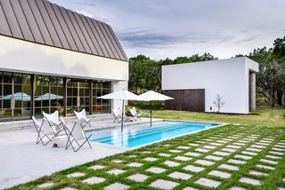 Own This Alluring Sculptural Abode in Austin For $3.1M - Photo 19 of 21 - The studio seen in the background here is adjacent to the home.