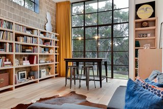 Own This Alluring Sculptural Abode in Austin For $3.1M - Photo 13 of 21 - There is also a workspace in the studio. 