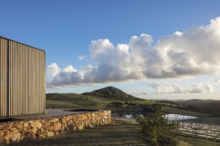 A New Prefab Hotel in Uruguay Seems to Melt Into the Landscape - Photo 2 of 9 - Each cabin has a private deck with a circular pool. The finishings are simple and expressive, and the materials are used in harmony with nature. 