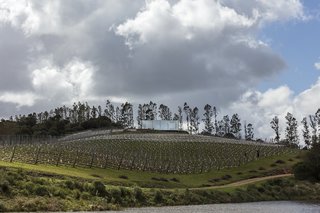 A New Prefab Hotel in Uruguay Seems to Melt Into the Landscape - Photo 8 of 9 - The mirrored facade reflects the sky and blends into the landscape. 
