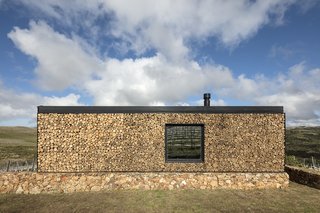 A New Prefab Hotel in Uruguay Seems to Melt Into the Landscape - Photo 3 of 9 - Local materials were used for on-site works, such as cut timber trunks for the rear wall and locally sourced stone for the platforms. 