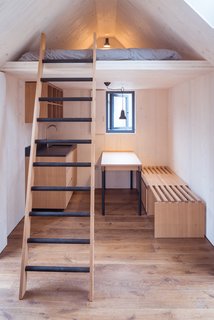 Go Off-Grid in This Prefabricated Cor-Ten Steel Cabin - Photo 9 of 12 - An internal mezzanine is an ideal sleeping space. 