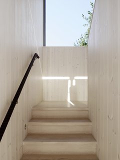The skylights and light color palette allow the home to boast a bright and airy feel. 