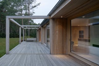The deck and pergola appear to be a natural extension of the home. 