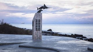 This Concrete Rest Stop Will Make You Want to Visit Norway - Photo 6 of 8 - In addition to the view, the contemplative site is a perfect setting for the WWII memorial that commemorates the 42 crew members who lost their lives when the Uredd submarine sank.