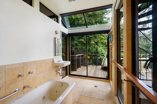 This Knockout Midcentury in the Bay Area Will Run You $1.9M - Photo 12 of 16 - Even the bathroom has a view.