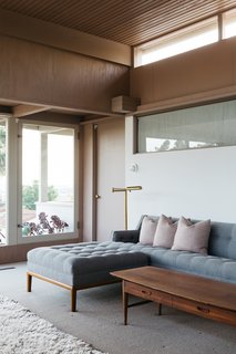 The living room opens to a balcony. 