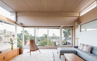 The home is airy and bright thanks to large expanses of glass, clerestory windows, and high ceilings. 