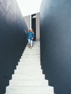 First and foremost, the home was designed to be a comfortable family home. The kid's bedrooms open directly to the garden spaces to make it easy for them to go outside and play. 