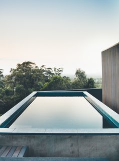 In addition to the pool, there is even a small orchard and terraced vegetable garden.