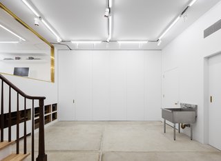 The doors are insulated panels that can be left opened or closed depending on the use of the space. 