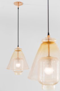 The kitchen lights were designed by August and custom-made by a local glass blower.