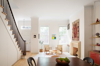 The entire parlor floor now serves as an open-plan kitchen, dining, and living area.