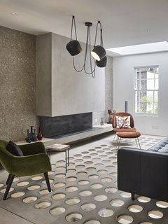 The use of the perforations throughout the home help to intensify the light through various aperture dimensions. They also led to the project's name: The Perf House.