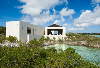 For Le Cabanon, a house in the Turks and Caicos islands north of the Dominican Republic, Joy took stock of the materials of the island—sand, rock and water—and created walls of brilliant white concrete.