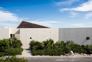 The home features a long, slender volume that shields the rest of the residence from the noise and movement on the adjacent street.