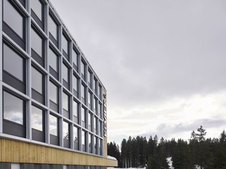 The metal façade of the foundation creates a patterned surface.