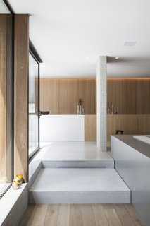 A few steps down from the kitchen is the built-in dining area. 