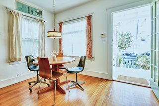 A dining area has been inserted near the entrance. 