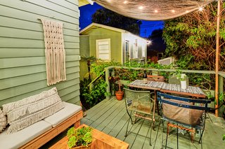 The outdoor space is perfect for indoor/outdoor entertaining. It also overlooks the guesthouse. 