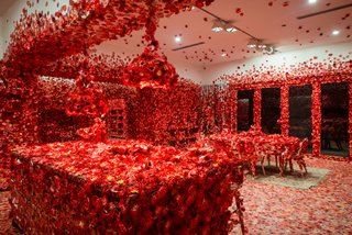The installation revisits the origins of Kusama’s art, which she traces back to her childhood. "One day, after gazing at a pattern of red flowers on the tablecloth, I looked up to see that the ceiling, the windows, and the columns seemed to be plastered with the same red floral pattern. I saw the entire room, my entire body, and the entire universe covered with red flowers, and in that instant, my soul was obliterated … this was not an illusion, but reality itself," the artist explains in a press statement. 