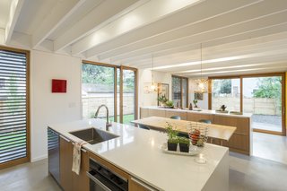 A view from the kitchen. The use of white on the walls and ceilings combined with the glazing provide a great sense of space throughout. 