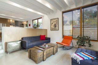 The main floor features an open kitchen and dining room, which are placed over the basement. 