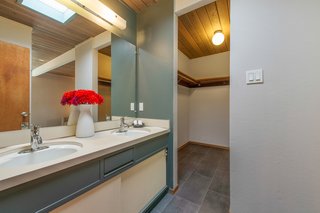  The master bedroom also has an en-suite bathroom and features a large walk-in closet. 