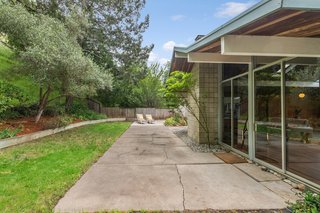 The backyard has lots of potential for outdoor entertaining.