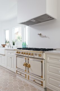 A beautiful La Cornue range is just one of the many high-end upgrades. 