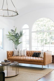  The large arched windows allow ample natural light to flood the interiors. 