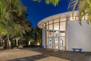 The home appears to glow from within at night. 