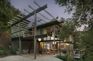The soaring two-story structure at dusk.