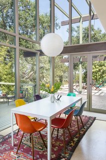 Double-height ceilings over the open dining area helps to create a nice, airy vibe.