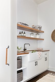The laundry room is simple and efficient.