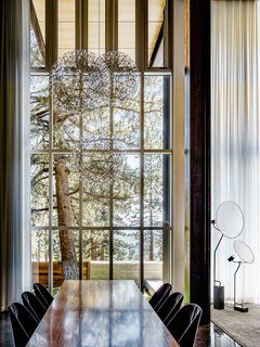 The extensive glazing provides a strong sense of the surrounding nature. 